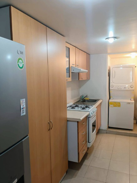 Cocina y área de lavado